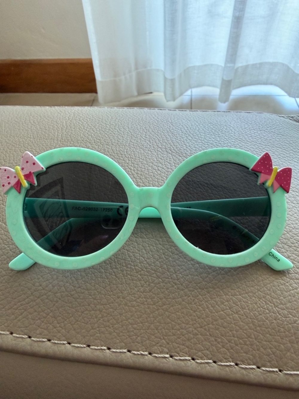 Disney Mint Green Round Kids Sunglasses with Pink Bow Accents